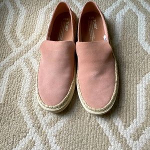 Dusty rose suede slip on Toms sneakers.  Never been worn.  Mint condition!